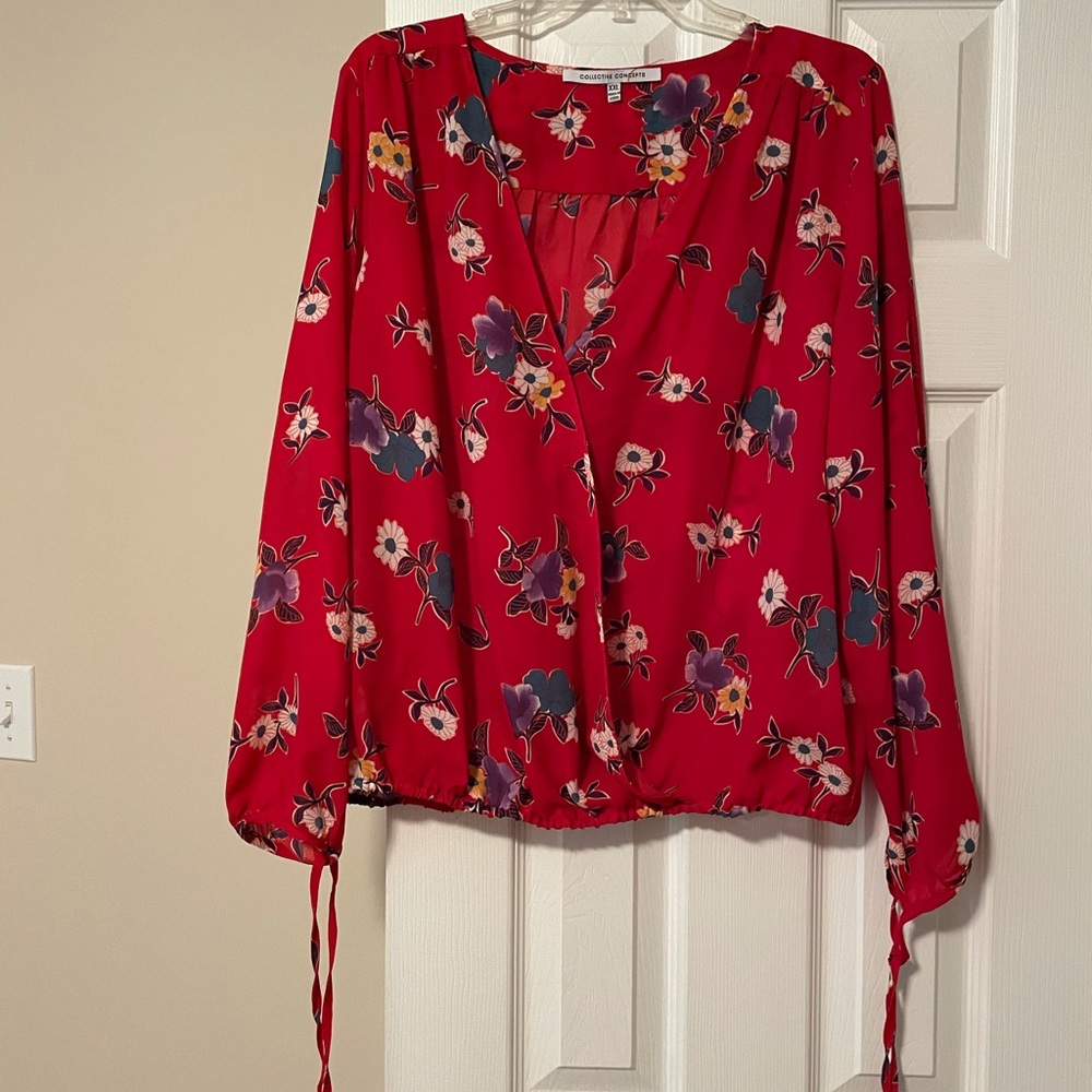 Red floral blouse. Size XXL. Runs small.